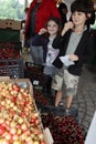 Kids have cherries on their ears on a farmerÃ¢â¬â¢s organic fruit market in Sofia, Bulgaria Ã¢â¬â June 6, 2015. Children and cherries.